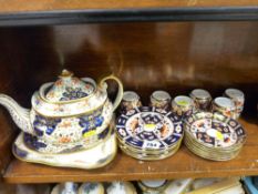 Six vintage Derby Imari trios, a similarly styled teapot on stand (spout damaged) etc