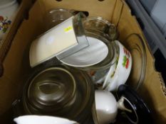 Box of predominantly Pyrex cookware