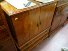 Two door bi-fold entertainment unit