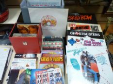 Cased quantity of 45rpm records to include Guns 'n' Roses, Aha, Enya, Kylie etc and a small quantity