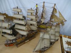Three fully rigged model sailing boats