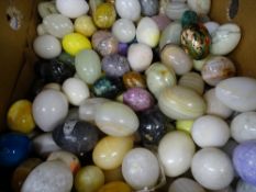 Box containing very large quantity of onyx and similar ornamental eggs