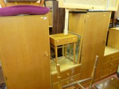 Parcel of mid Century compact bedroom furniture comprising two small wardrobe, chest of drawers,
