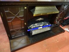 Dark wood fire surround with electric heater E/T