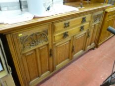 Possibly oak sideboard with four cupboards and two central drawers