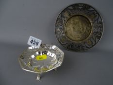 Small pierced edge sweetmeat dish on four feet and a pierced edge bottle stand, both hallmarked