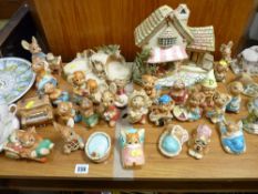 Collection of Pendelfin figurines and ornamental stands