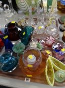 Two trays of various glassware including Vaseline glass, decorative paperweights, dressing table