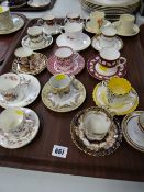 Sixteen various coffee cans & saucers including Aynsley, Spode, Charlotte Rheade etc