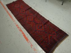 A red & blue patterned Meshwani runner, 248 x 72cms