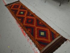 A mainly brown & orange Suzni Kilim runner, 66 x 260cms