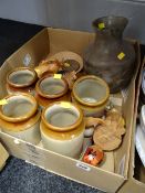 Collection of stoneware storage jars, carved wooden animals etc