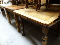 Two vintage oak extending dining tables