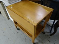 A vintage light oak two-tier drop leaf tea trolley, 62 x 61 x 85cms
