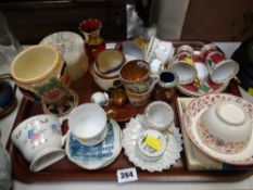 Tray of various collectables, mainly miniature cups & saucers
