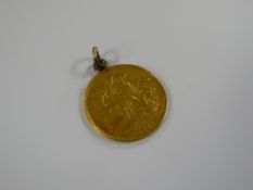 An 1887 Queen Victoria double sovereign with mount attached to rim