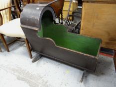 Early twentieth century stained pine rocking crib