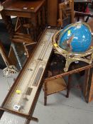 An Admiral Fitzroy barometer together with a decorative globe