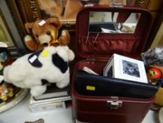 Collection of various ladies' purses, bags, soft toys etc