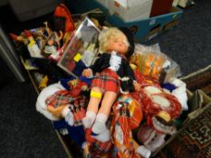 A crate of boxed & unboxed collector's dolls