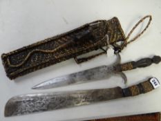 An African tribal two-piece knife set in carry case