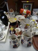 A set of three Staffordshire graduated jugs, Toby Jugs, Staffordshire flat backs etc