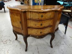 A reproduction Dutch-style bow front & inlaid three-drawer chest with side cupboards, 85 x 116 x