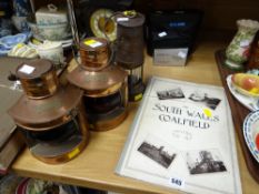 Pair of modern small copper mast head lamps, miner's lamp , publication relating to the South