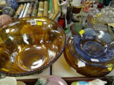 A large decorated carnival-glass bowl together with an amber glass bowl etc