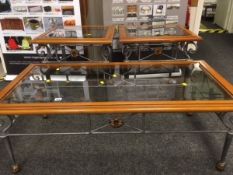 Glass top Long John coffee table with grey metal base together with a pair of matching lamp tables