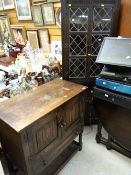 A small Old Charm-style cabinet together with a dark oak lead-glazed two-door standing corner