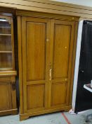 A good modern Gola Furniture stained oak two-door wardrobe, 197 x 110 x 60cms