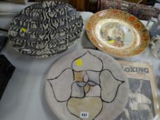 Two African decorated large chargers together with a Japanese decorated plate