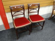 A pair of Regency mahogany dining chairs
