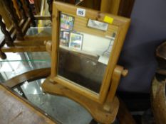A small pine toilet mirror