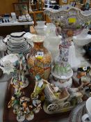 A tray of mainly Continental china including porcelain 'monkey band', Royal Doulton figure 'Dressing