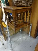 A vintage oak nest of three tables with barley-twist legs together with a chrome & glass TV stand