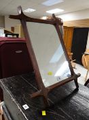 A rustic oak easel-style dressing mirror