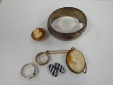A silver bangle, 9ct gold cameo brooch together with another yellow metal cameo, silver ring etc
