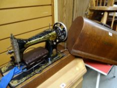 A vintage cased Singer sewing machine