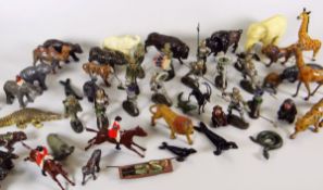 A large quantity of early twentieth century hollow-cast figures being zoo animals, equestrian &