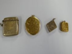 A 9ct gold locket together with a smaller locket believed gold, hallmarked silver vesta case &