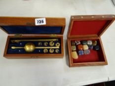 A cased hydrometer & souvenir brass decorated box & contents of various agate specimens