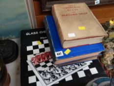 Two vintage volumes of Shipping Wonders of the World, a boxed glass chess drinking game etc