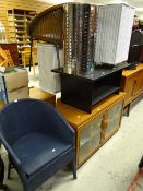 A parcel of furniture to include small black ash coffee table, entertainment unit, linen basket,