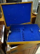 A metal banded wooden cutlery box with carry handles (empty)