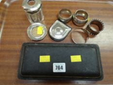A cased hallmarked silver-handled shoe horn, silver napkin rings, small silver frame etc