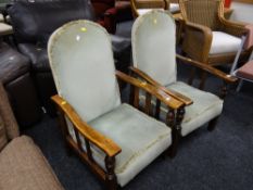 Two vintage wooden framed & upholstered adjustable recliner armchairs
