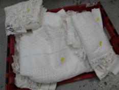 A crate of good vintage table linen