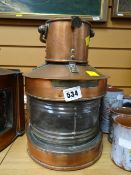 A polished copper mast head light converted to electricity E/T